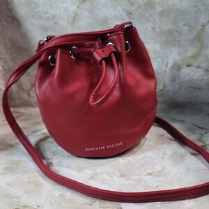 Danielle Nicole Alexa Mini Bucket bag in red faux leather. 